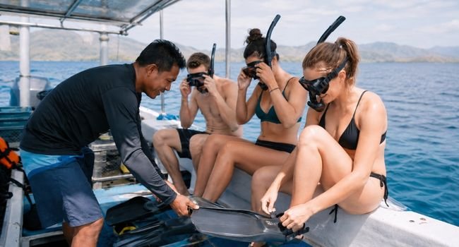 Travelers preparing for whale shark snorkeling in Sumbawa