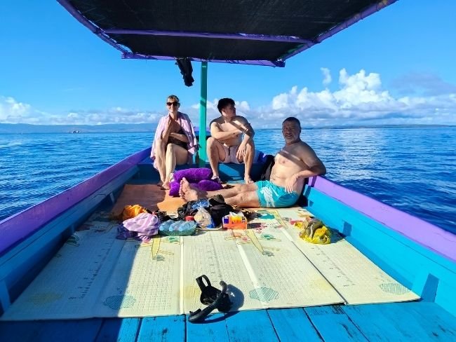 Travelers on boat in Saleh Bay Sumbawa
